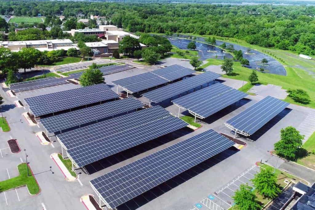 Aerial shot of a solar panels in a parking lot