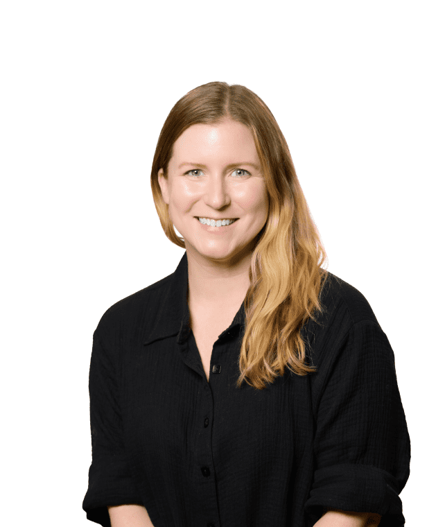 A smiling woman with long hair wearing a black shirt against a white background.