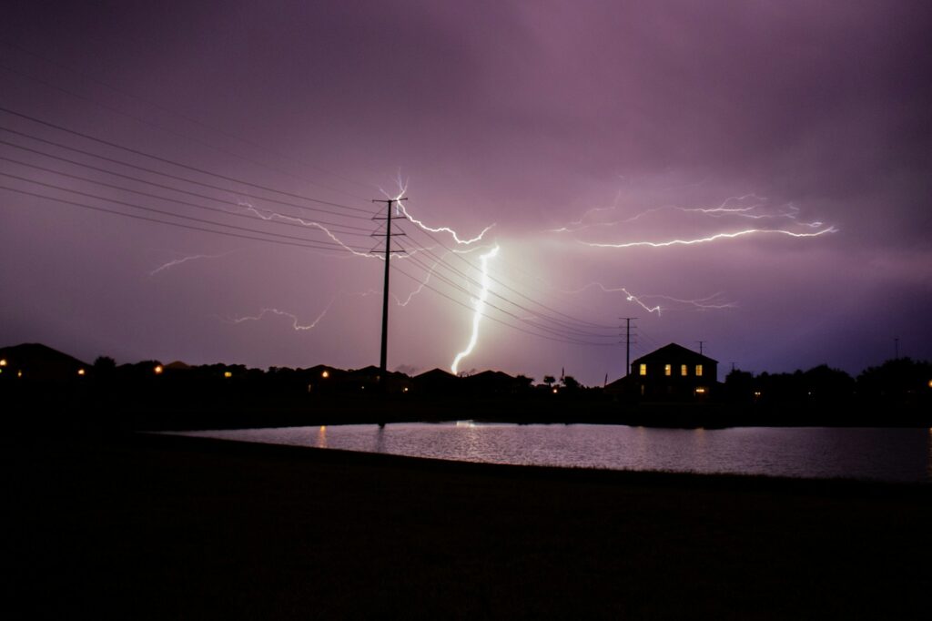 Electricity transmission lines in a storm.
